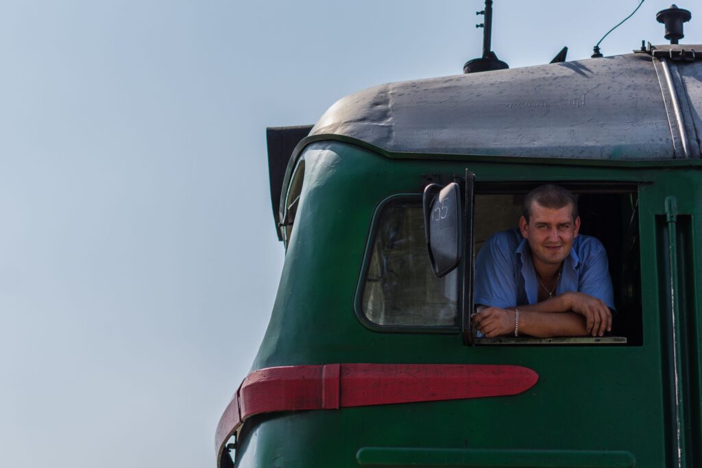 Train driver peeking out of an old Soviet locomotive nicknamed Sergey after a journey from Lviv to Ivano-Frankivsk. He allowed me in and I had a privilege to take a look at the engine.