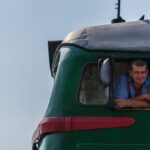 Train driver peeking out of an old Soviet locomotive nicknamed Sergey after a journey from Lviv to Ivano-Frankivsk. He allowed me in and I had a privilege to take a look at the engine.