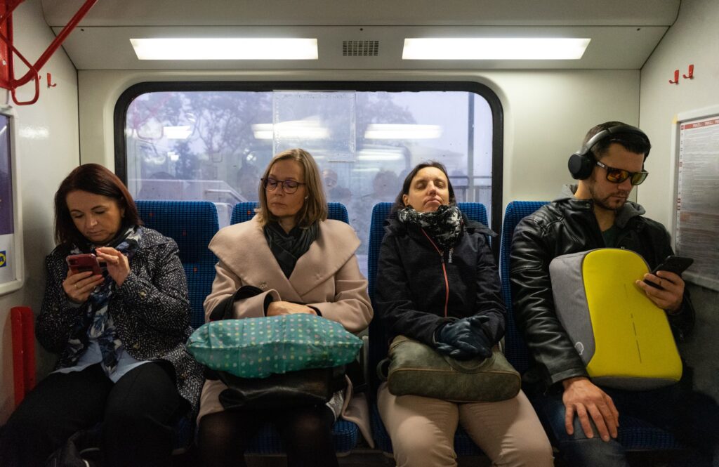 Early commuters to work in a suburban train line in Prague