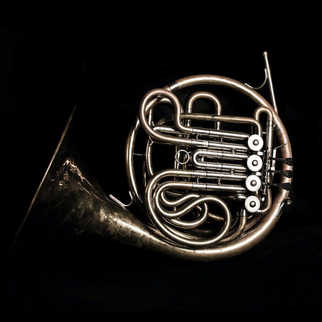 A French horn – musical instrument. Photo by <a href="https://unsplash.com/@leggie02?utm_source=unsplash&utm_medium=referral&utm_content=creditCopyText">Asher Legg</a> on <a href="https://unsplash.com/photos/XIe1b4k9-k0?utm_source=unsplash&utm_medium=referral&utm_content=creditCopyText">Unsplash</a>